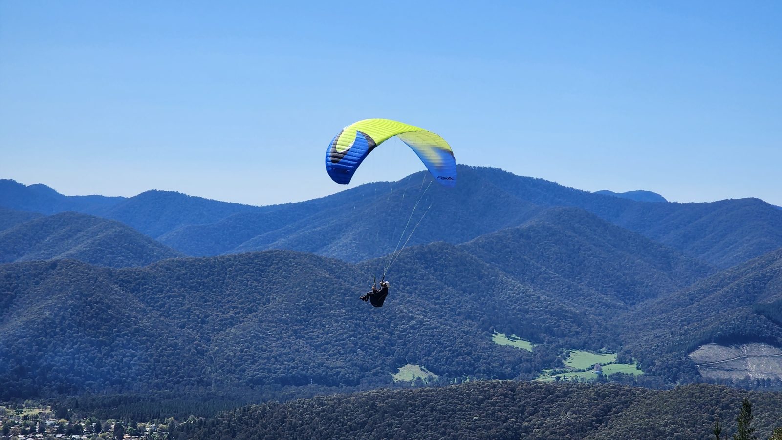 A paraglider over the Kiewa Valley ranges