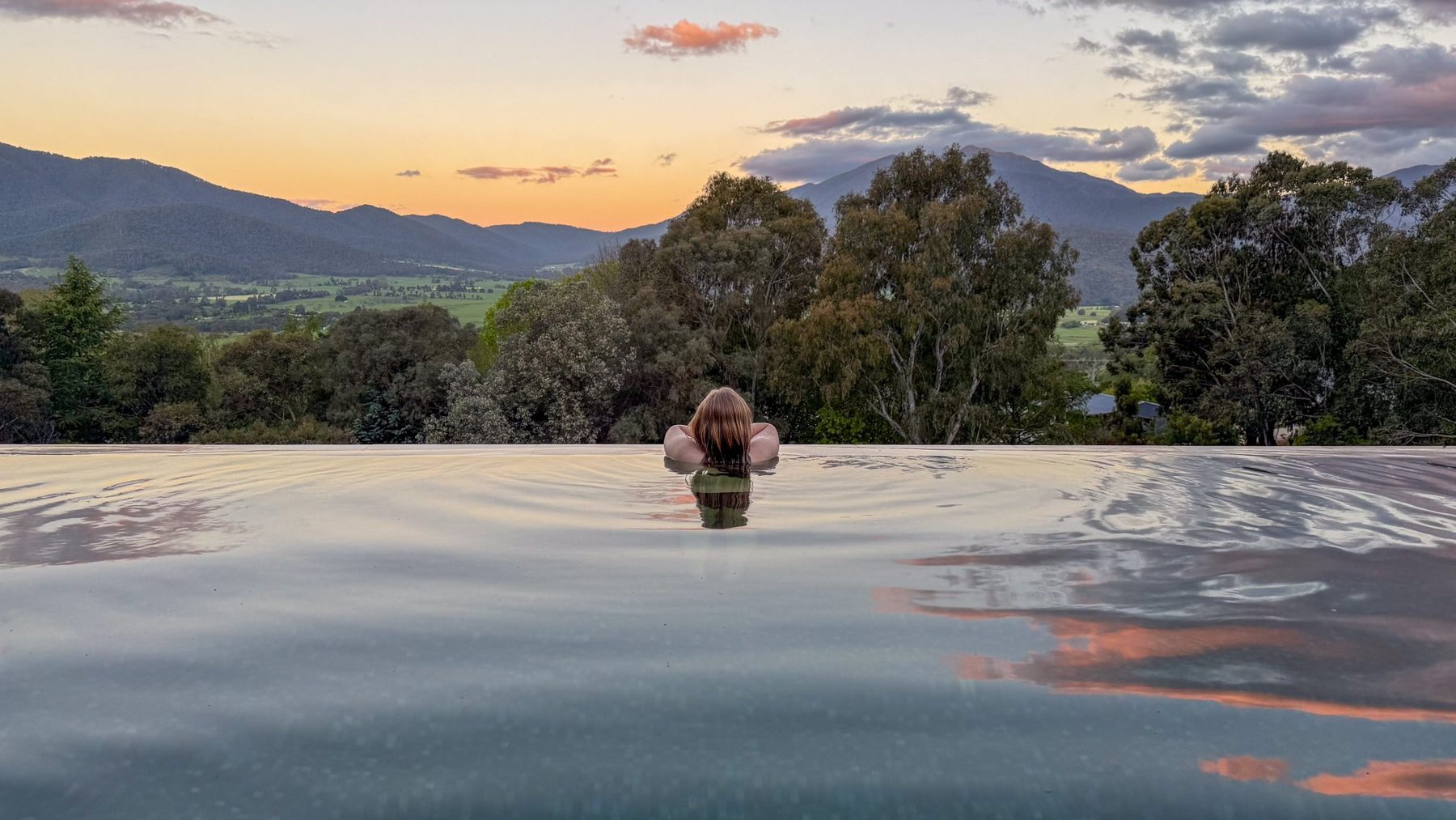 Sunset from the infinity pool on the Log Banya deck, Mount Beauty: the Kiewa Valley and the ranges