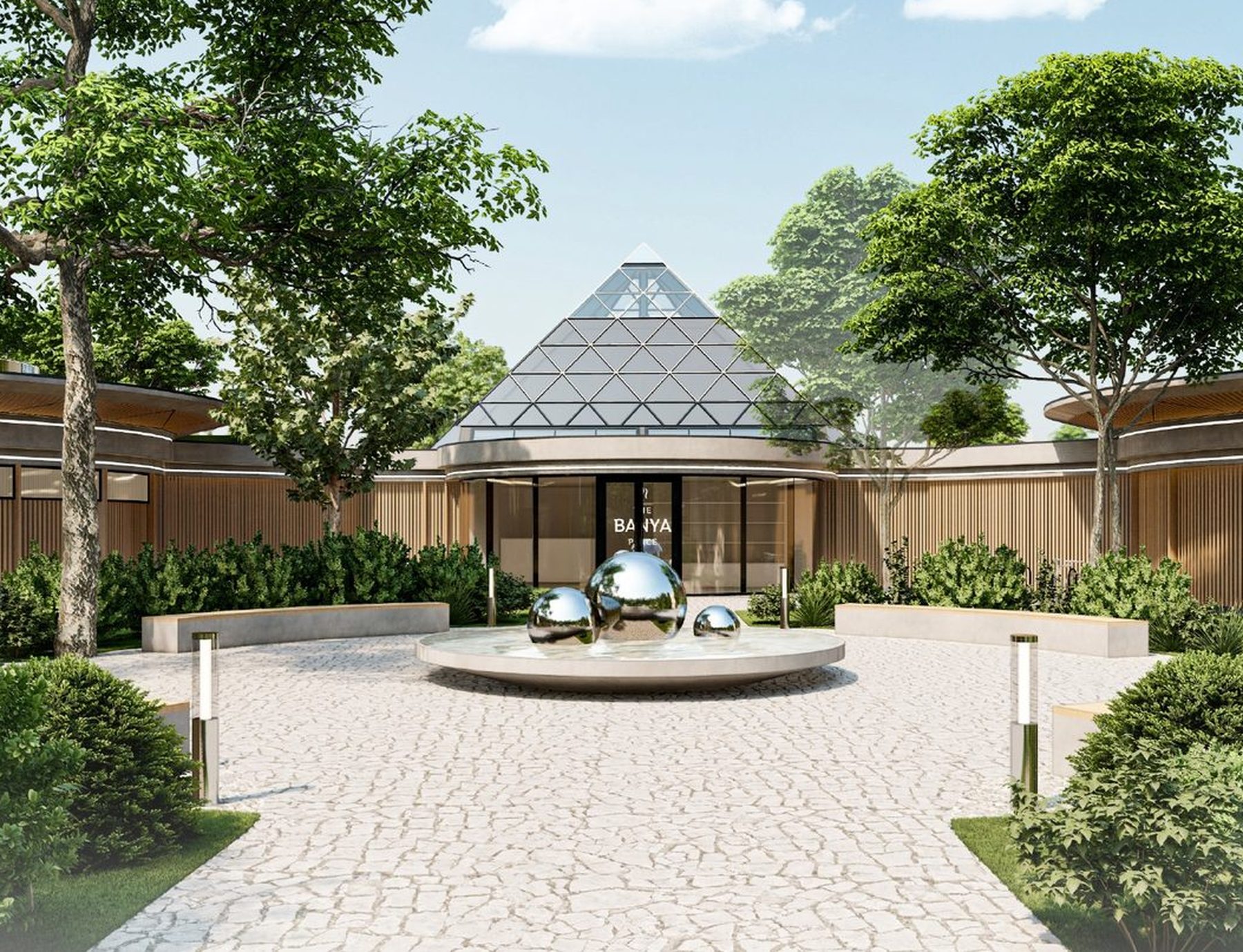 Concept render of the bathhouse entrance in Bright: a glass pyramid roof over the timber-clad pavilion, with a sphere fountain in the courtyard