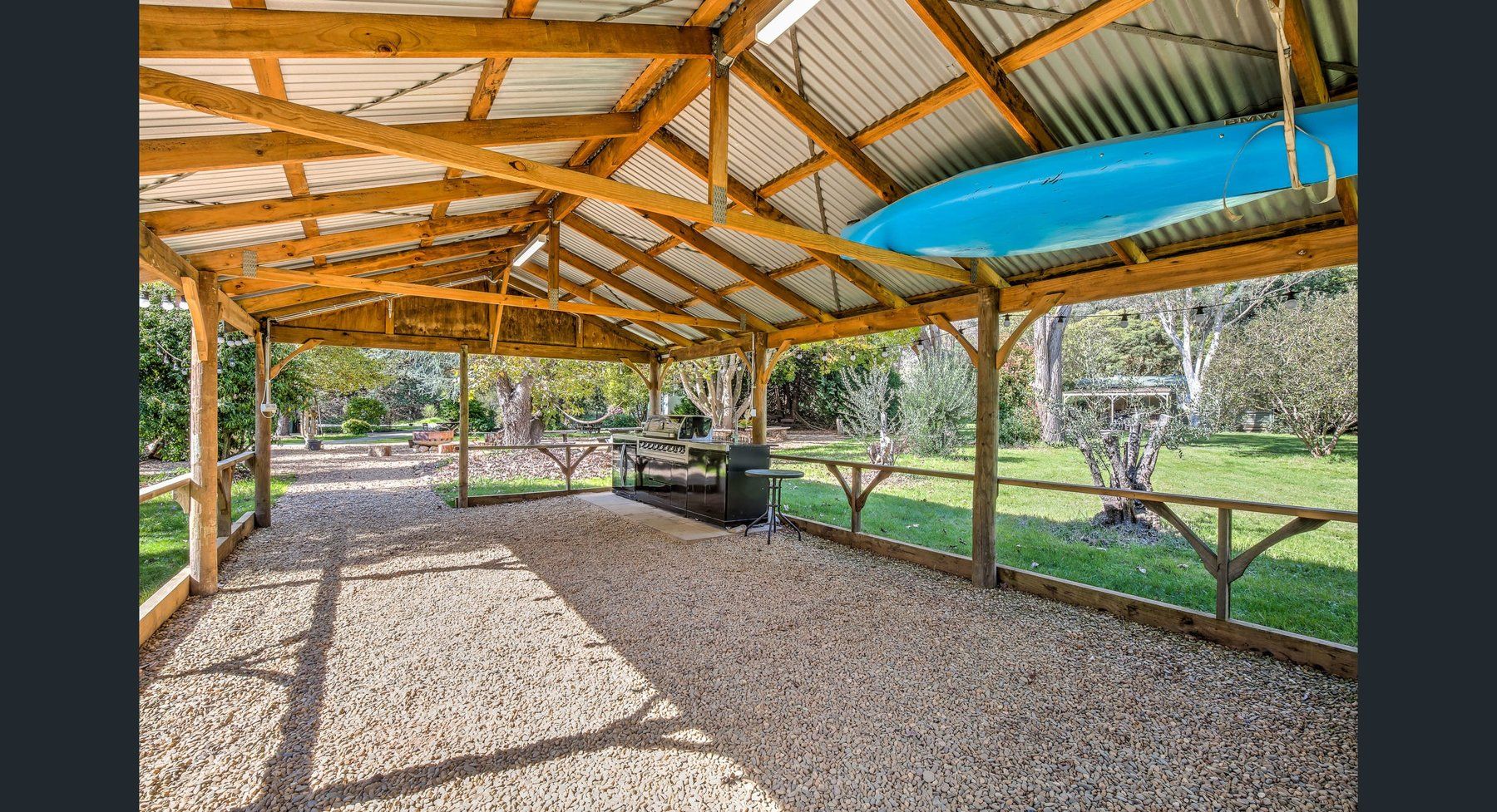The covered shelter on the lawn