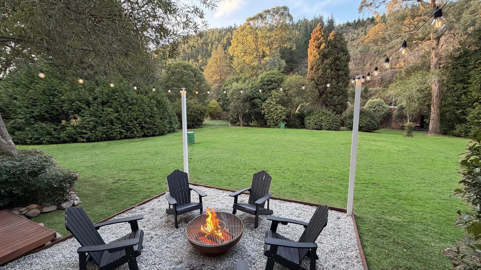 The firepit circle with chairs at dusk