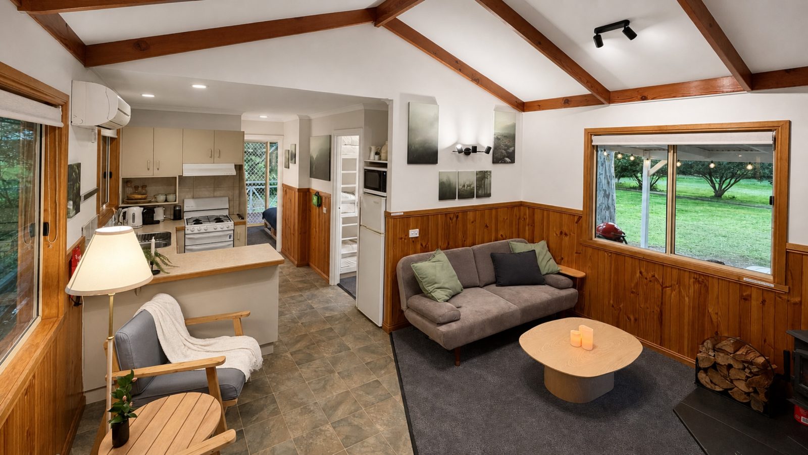 The kitchen and living area of The Cabin, Bright