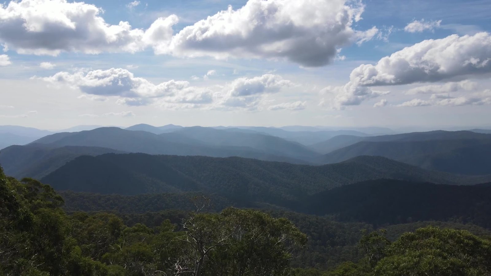 Clouds over the blue ranges of the Victorian Alps near Bright and Mount Beauty